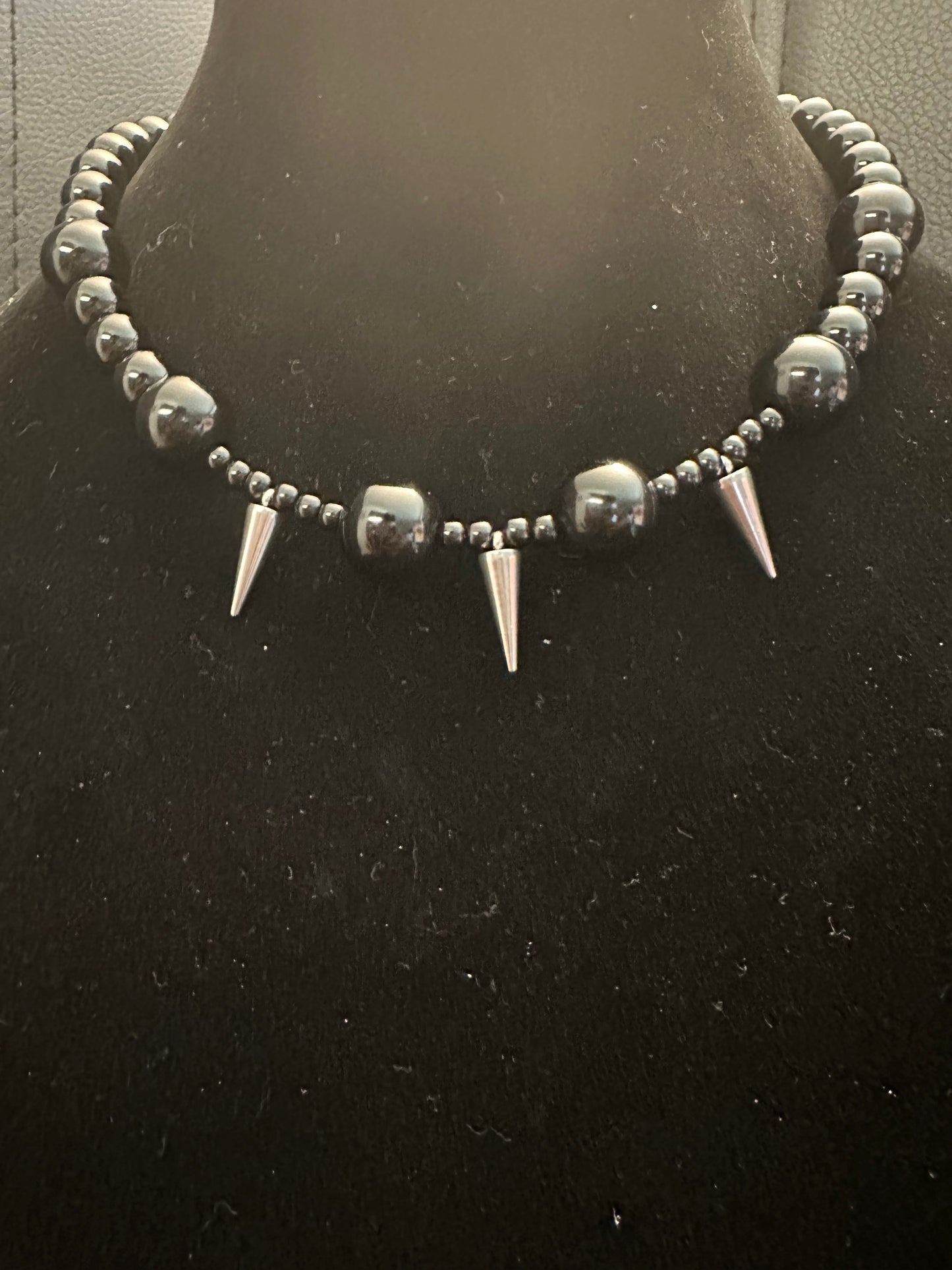 Black beads spiked
