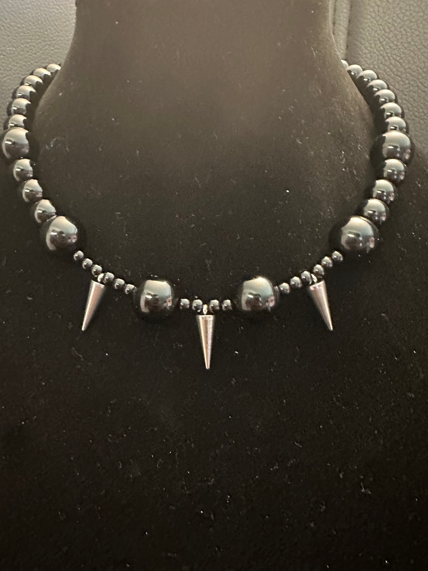 Black beads spiked