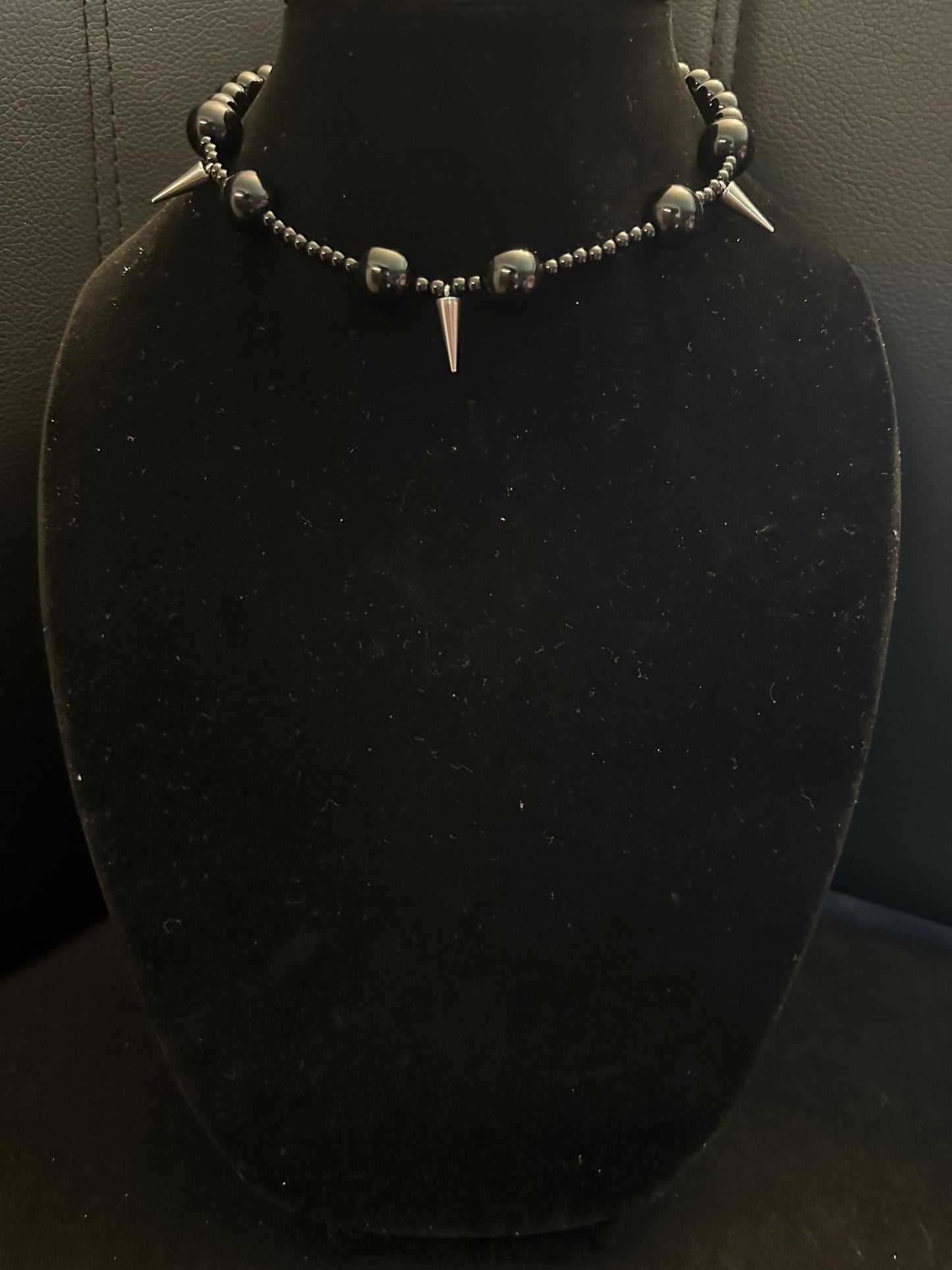Black beads spiked
