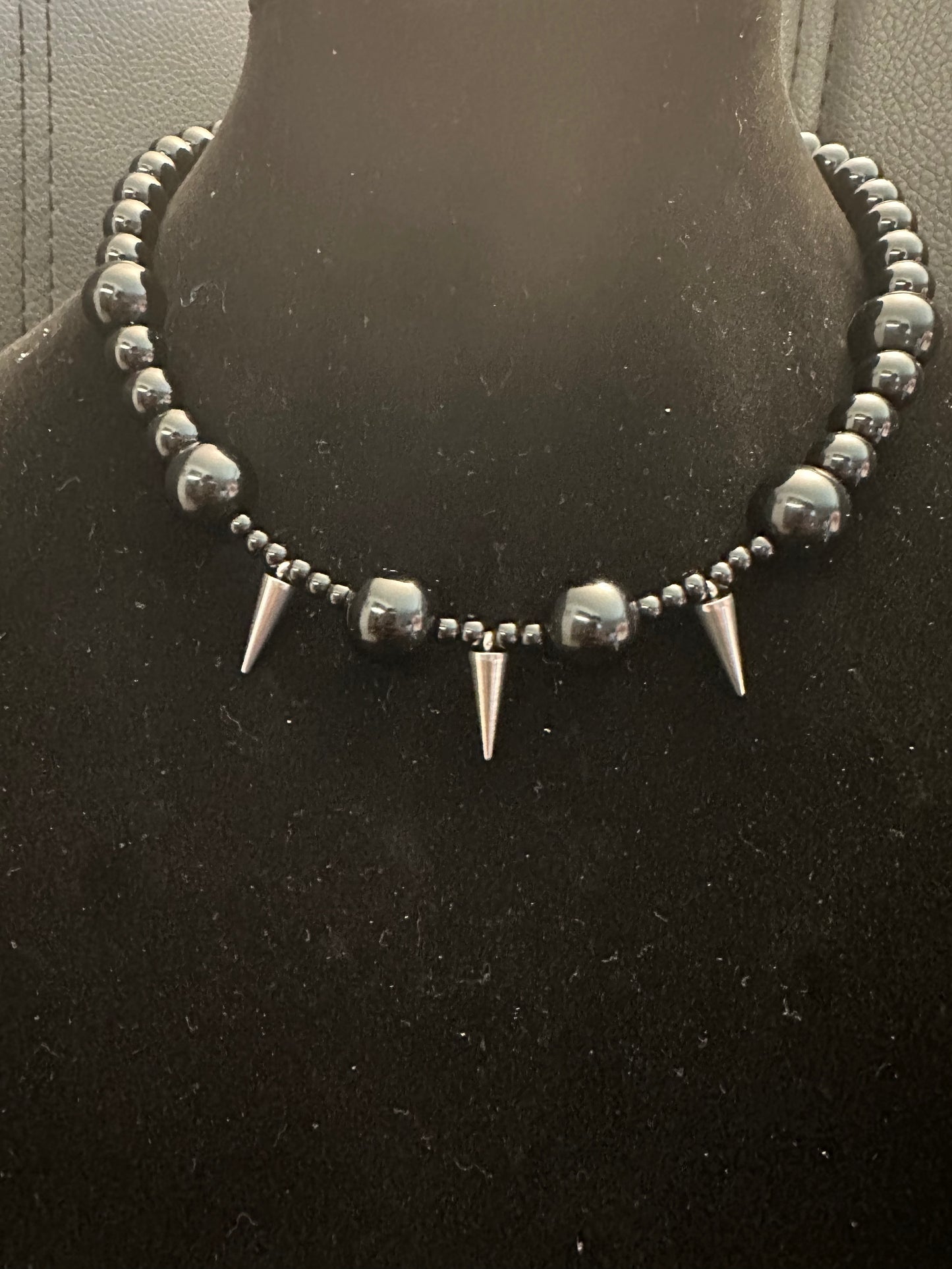 Black beads spiked