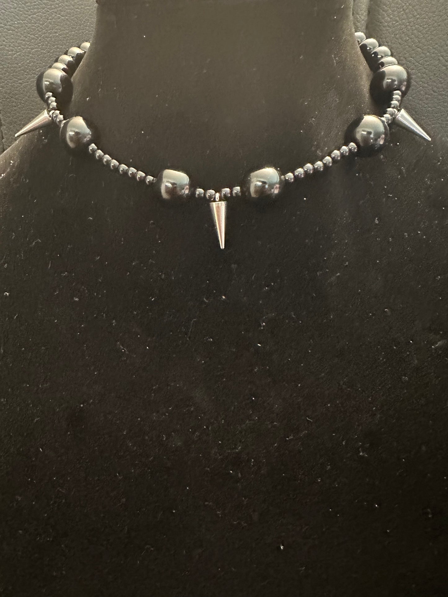 Black beads spiked
