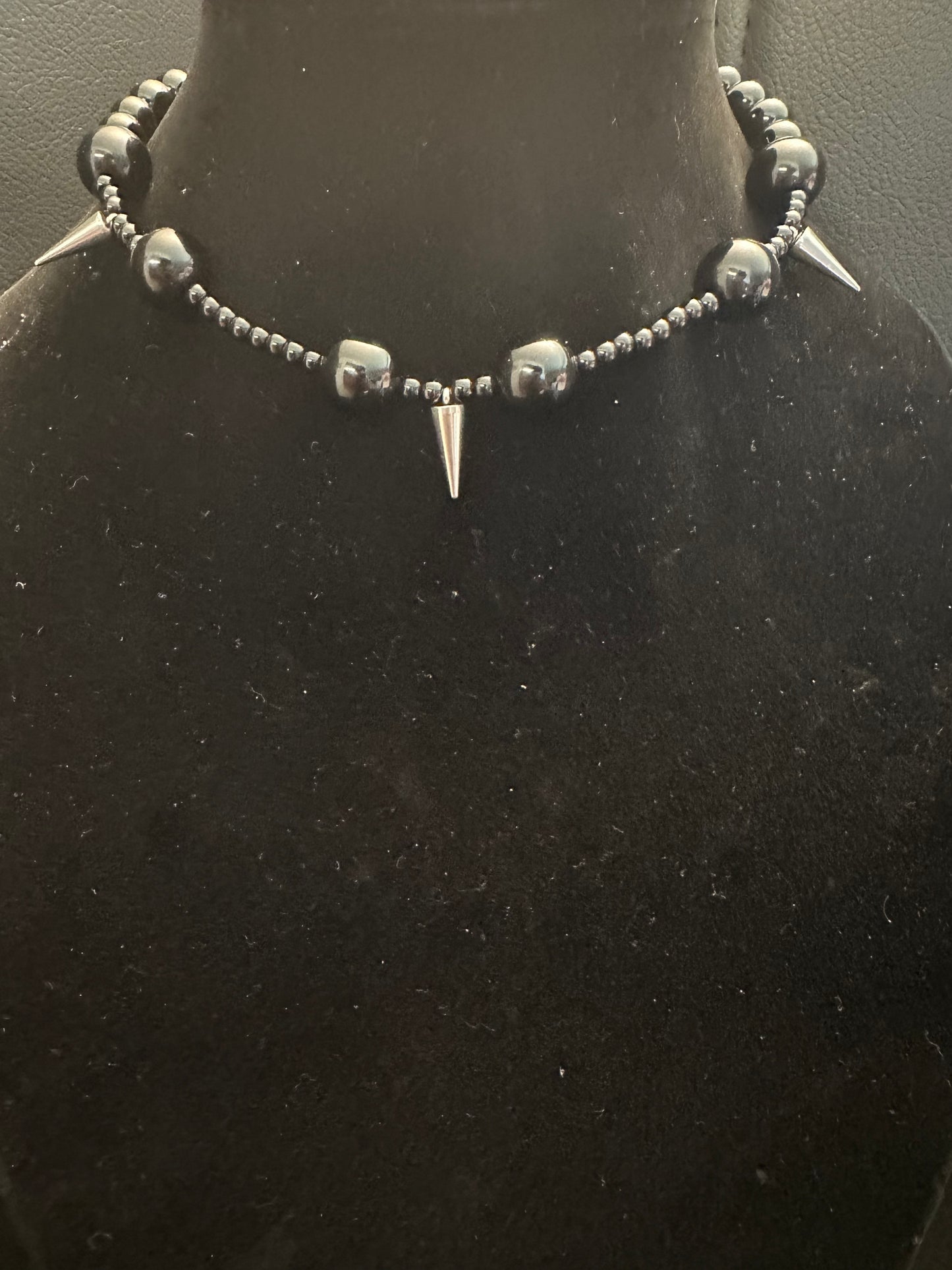 Black beads spiked