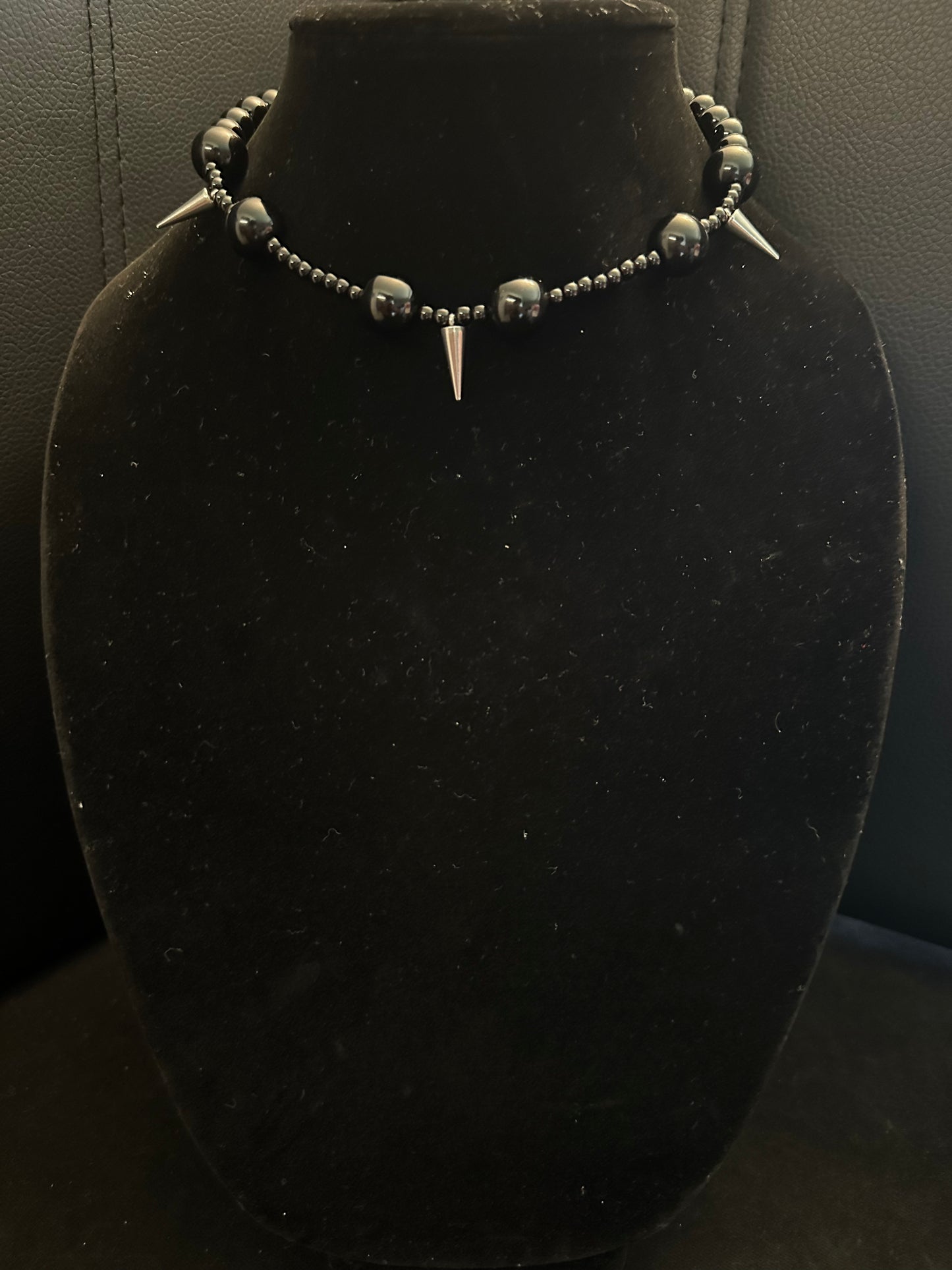 Black beads spiked